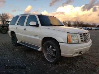 2004 Cadillac Escalade z VIN 1GYEK63N64R200175, wystawiony jako Copart lot #86566364 z przebiegiem Nie podano mil oraz Szkoda całkowita • Salvage title. Historia ofert i sprzedaży dostępna na DreamBid. Obrazek 4.