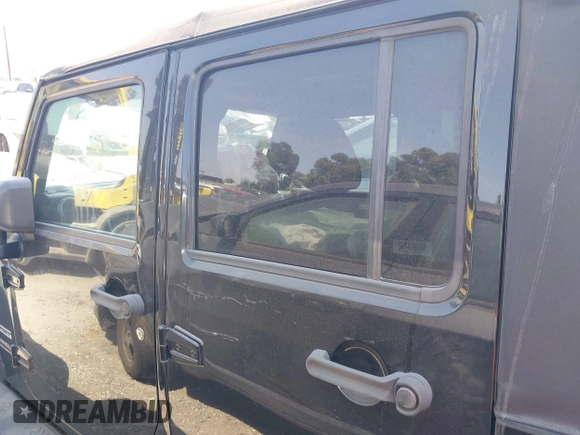 2017 Jeep Wrangler Unlimited Sport with VIN 1C4HJWDG1HL551090, listed as a IAAI auction lot 42619497 with 92,693 mi miles and . Bid and sale history available at DreamBid. Image 14.