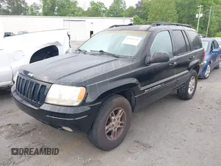 2000 Jeep Grand Cherokee Laredo with VIN 1J4G258S0YC182928, listed as a IAAI auction lot 42113376 with 259,882 mi miles and . Bid and sale history available at DreamBid. Image 2.