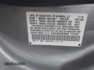 2009 Honda Odyssey EX-L with VIN 5FNRL38649B028066, listed as a IAAI auction lot 42059473 with 193,122 mi miles. Bid and sale history available at carsss.com. Image 9.