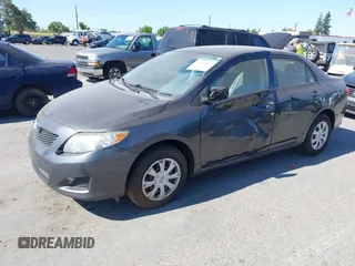 2009 Toyota Corolla with VIN 1NXBU40E99Z108425, listed as a IAAI auction lot 39553892 with 208,165 mi miles and . Bid and sale history available at DreamBid. Image 2.