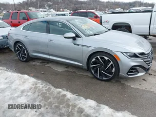 2021 Volkswagen Arteon SEL Premium R-Line z VIN WVWTR7AN6ME003015, wystawiony jako IAAI lot #41355535 z przebiegiem 41 731 mil mil oraz . Historia ofert i sprzedaży dostępna na DreamBid. Obrazek 1.