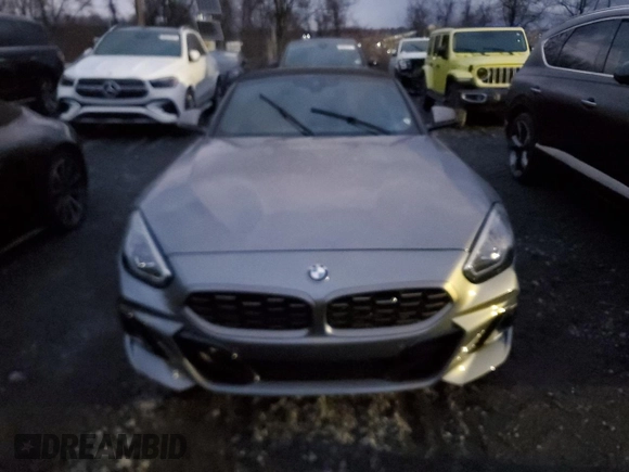 2024 BMW Z4 sDriveM40i with VIN WBAHF9C02RWY35106, listed as a Copart auction lot 82878254 with 3,199 mi miles and Salvage title. Bid and sale history available at DreamBid. Image 5.