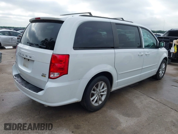 2015 Dodge Grand Caravan SXT with VIN 2C4RDGCG2FR548433, listed as a IAAI auction lot 42121256 with 161,459 mi miles and . Bid and sale history available at DreamBid. Image 4.