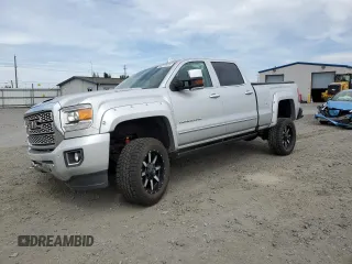 2018 GMC Sierra 2500HD Denali z VIN 1GT12UEY3JF257611, wystawiony jako Copart lot #56377575 z przebiegiem 94 325 mil mil oraz Szkody całkowita. Historia ofert i sprzedaży dostępna na DreamBid. Obrazek 1.