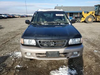 2001 Honda Passport LX z VIN 4S6DM58W014404165, wystawiony jako Copart lot #81636614 z przebiegiem 157 744 mil mil oraz Czysty tytuł • Clean title. Historia ofert i sprzedaży dostępna na DreamBid. Obrazek 5.