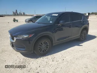 2021 Mazda CX-5 Touring with VIN JM3KFACM5M0410995, listed as a Copart auction lot 48574735 with 36,603 mi miles and Salvage Title. Bid and sale history available at carsss.com. Image 1.