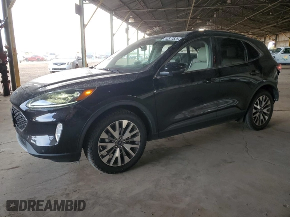 2020 Ford Escape Titanium Hybrid z VIN 1FMCU9DZ2LUB49050, wystawiony jako Copart lot #42517525 z przebiegiem 66 890 mil mil oraz Szkoda całkowita • Salvage title. Historia ofert i sprzedaży dostępna na DreamBid. Obrazek 1.