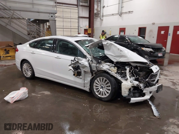 2015 Ford Fusion SE Hybrid with VIN 3FA6P0LU1FR225241, listed as a IAAI auction lot 42349797 with 85,725 mi miles and . Bid and sale history available at DreamBid. Image 1.