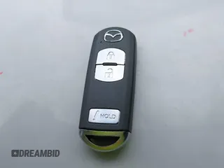 2016 Mazda 3 S Grand Touring z VIN JM1BM1N36G1344247, wystawiony jako IAAI lot #41382859 z przebiegiem 40 710 mil mil oraz . Historia ofert i sprzedaży dostępna na DreamBid. Obrazek 11.