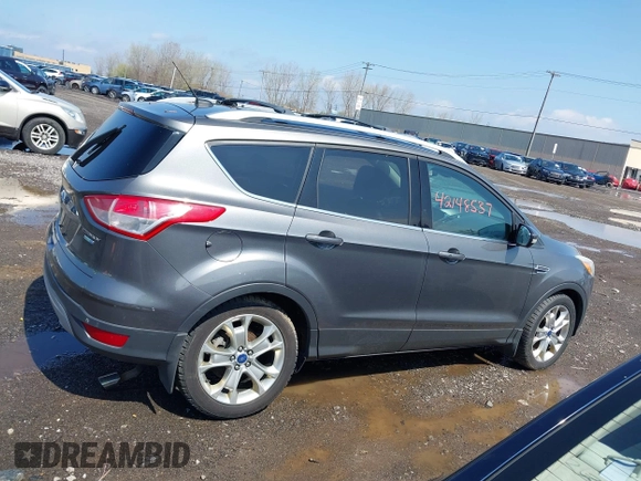 2014 Ford Escape Titanium with VIN 1FMCU9J99EUA75276, listed as a IAAI auction lot 42148537 with 163,330 mi miles and . Bid and sale history available at DreamBid. Image 13.