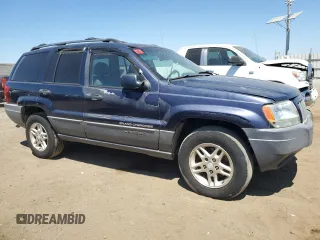 2004 Jeep Grand Cherokee Laredo with VIN 1J4GW48S34C343281, listed as a Copart auction lot 63253325 with 247,697 mi miles and Clean title. Bid and sale history available at DreamBid. Image 4.