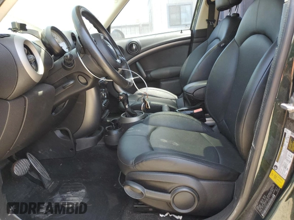 2012 MINI Countryman S with VIN WMWZC3C58CWL83403, listed as a Copart auction lot 61290125 with 122,714 mi miles and Clean title. Bid and sale history available at DreamBid. Image 7.