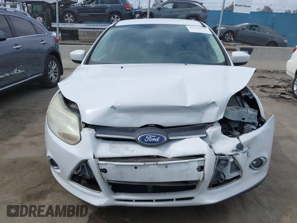 2012 Ford Focus SE с VIN 1FAHP3F2XCL121264, выставлен на аукционе IAAI как лот 42243139 с пробегом 189 442 миль миль и . История ставок и продаж доступна на DreamBid. Изображение 13.