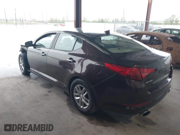 2013 Kia Optima LX with VIN 5XXGM4A76DG252622, listed as a IAAI auction lot 41890887 with 128,002 mi miles and . Bid and sale history available at carsss.com. Image 3.