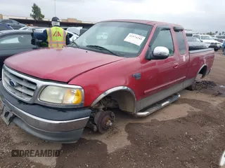 2002 Ford F-150 XL with VIN 1FTRX17W72NB88475, listed as a IAAI auction lot 41574244 with 200,396 mi miles. Bid and sale history available at carsss.com. Image 2.