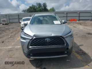 2023 Toyota Corolla Cross XLE with VIN 7MUDAAAG0PV057750, listed as a IAAI auction lot 42302284 with 31,404 mi miles and . Bid and sale history available at DreamBid. Image 12.