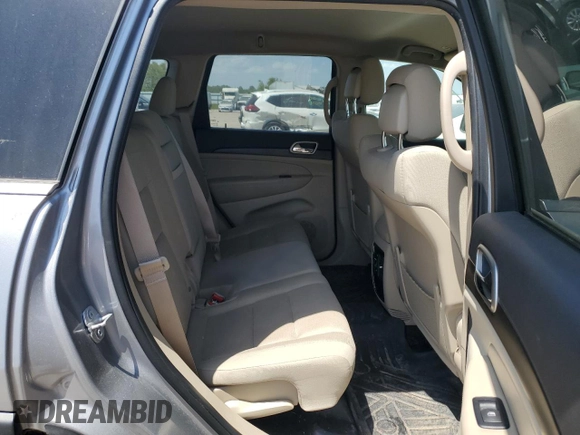 2017 Jeep Grand Cherokee Laredo with VIN 1C4RJEAG0HC816410, listed as a Copart auction lot 52909905 with 102,326 mi miles and Salvage title. Bid and sale history available at DreamBid. Image 10.