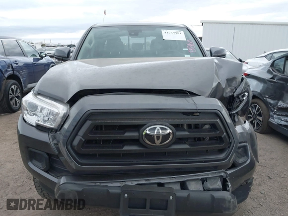 2022 Toyota Tacoma SR with VIN 3TYAX5GN8NT066318, listed as a IAAI auction lot 41739981 with 50,186 mi miles and . Bid and sale history available at DreamBid. Image 12.