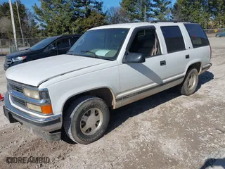 1996 Chevrolet Tahoe Limited with VIN 1GNEC13R0TJ309292, listed as a IAAI auction lot 41412643 with 219,815 mi miles. Bid and sale history available at carsss.com. Image 2.