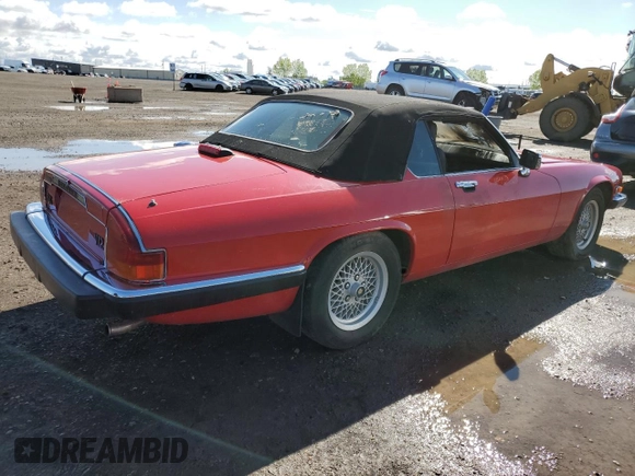 1989 Jaguar XJS z VIN SAJNL4841KC160063, wystawiony jako Copart lot #57462075 z przebiegiem 120 979 mil mil oraz Szkoda całkowita • Salvage title. Historia ofert i sprzedaży dostępna na DreamBid. Obrazek 3.