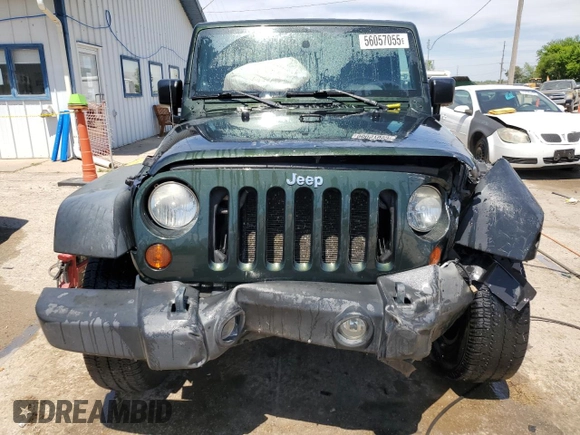 2010 Jeep Wrangler Rubicon with VIN 1J4BA6D12AL221220, listed as a Copart auction lot 56057055 with 200,346 mi miles and Salvage title. Bid and sale history available at DreamBid. Image 5.