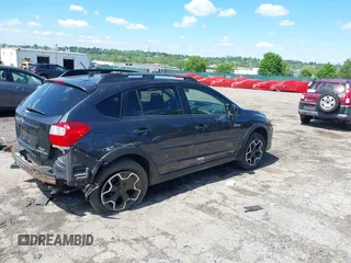 2014 Subaru Crosstrek Premium z VIN JF2GPAVC8E8285172, wystawiony jako IAAI lot #42221167 z przebiegiem 166 265 mil mil oraz . Historia ofert i sprzedaży dostępna na DreamBid. Obrazek 4.