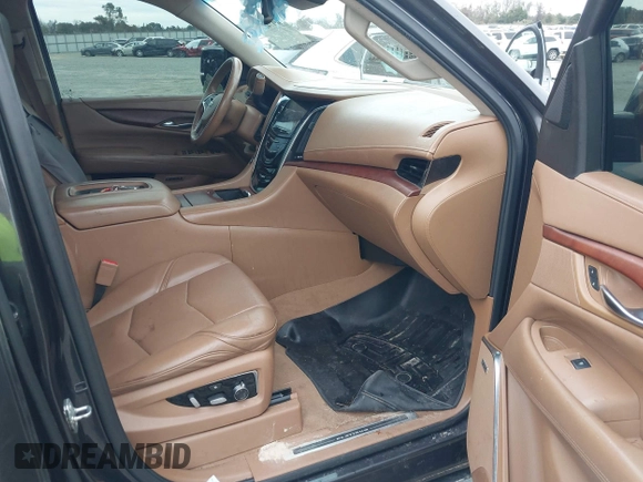 2016 Cadillac Escalade Platinum z VIN 1GYS4DKJ1GR363238, wystawiony jako IAAI lot #40974636 z przebiegiem 128 296 mil mil oraz . Historia ofert i sprzedaży dostępna na DreamBid. Obrazek 5.