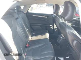 2016 Ford Fusion Titanium Hybrid with VIN 3FA6P0RU2GR357739, listed as a IAAI auction lot 42120441 with 151,201 mi miles. Bid and sale history available at carsss.com. Image 8.