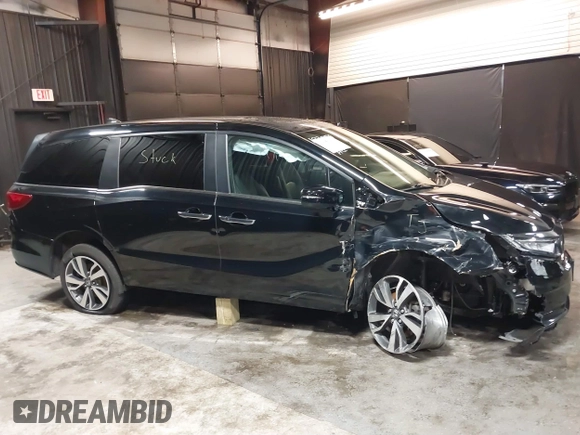 2021 Honda Odyssey Touring with VIN 5FNRL6H83MB040138, listed as a IAAI auction lot 39150096 with 61,322 mi miles and . Bid and sale history available at DreamBid. Image 13.