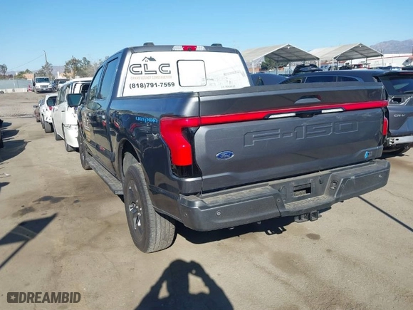 2022 Ford F-150 Lightning Pro with VIN 1FTVW1EL9NWG16717, listed as a IAAI auction lot 41290556 with 24,865 mi miles. Bid and sale history available at carsss.com. Image 3.