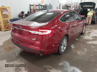 2017 Ford Fusion SE z VIN 3FA6P0HD8HR405800, wystawiony jako IAAI lot #41823918 z przebiegiem 54 034 mil mil oraz . Historia ofert i sprzedaży dostępna na DreamBid. Obrazek 4.