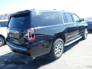 2015 GMC Yukon XL Denali with VIN 1GKS1JKJ1FR134428, listed as a IAAI auction lot 42149588 with 116,207 mi miles. Bid and sale history available at carsss.com. Image 4.