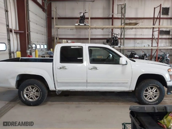 2012 Chevrolet Colorado LT w/1LT with VIN 1GCHTCFEXC8128458, listed as a IAAI auction lot 41758826 with 267,202 mi miles. Bid and sale history available at carsss.com. Image 13.