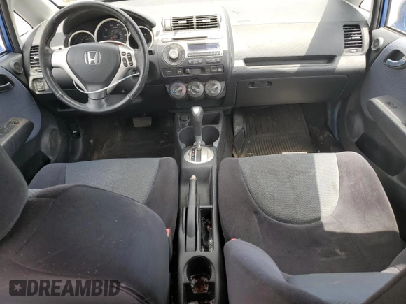 2007 Honda Fit Sport with VIN JHMGD38687S014318, listed as a Copart auction lot 53992935 with 59,504 mi miles and Clean title. Bid and sale history available at DreamBid. Image 8.