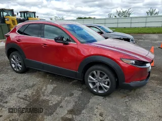 2021 Mazda CX-30 Premium with VIN 3MVDMBDL2MM314904, listed as a Copart auction lot 57061385 with 27,420 mi miles and Clean title. Bid and sale history available at DreamBid. Image 4.