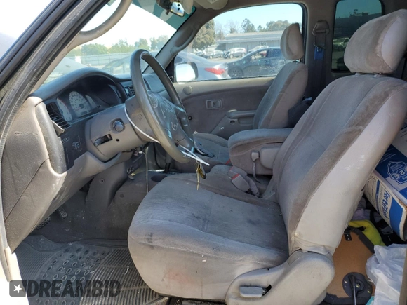 2003 Toyota Tacoma z VIN 5TEVL52N83Z209302, wystawiony jako Copart lot #59814235 z przebiegiem 207 606 mil mil oraz Szkoda całkowita • Salvage title. Historia ofert i sprzedaży dostępna na DreamBid. Obrazek 7.