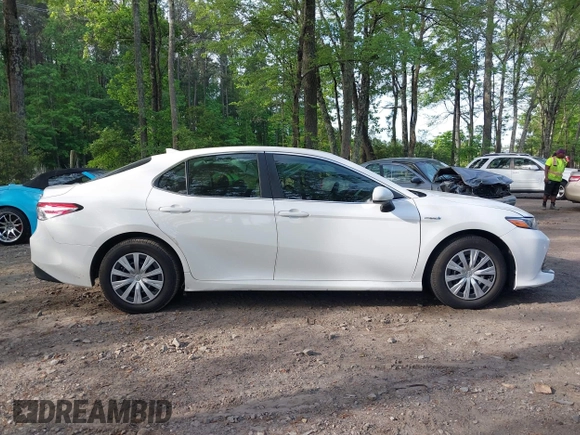 2019 Toyota Camry Hybrid LE z VIN 4T1B31HK4KU005351, wystawiony jako IAAI lot #42162802 z przebiegiem 89 187 mil mil oraz . Historia ofert i sprzedaży dostępna na DreamBid. Obrazek 13.