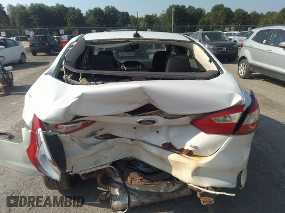 2013 Ford Focus SE with VIN 1FADP3F28DL215983, listed as a IAAI auction lot 42659890 with 117,912 mi miles and . Bid and sale history available at DreamBid. Image 16.