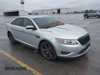 2010 Ford Taurus SHO z VIN 1FAHP2KT0AG130490, wystawiony jako IAAI lot #42149805 z przebiegiem 175 977 mil mil oraz . Historia ofert i sprzedaży dostępna na DreamBid. Obrazek 1.