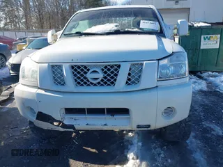 2012 Nissan Titan SV with VIN 1N6BA0EJ0CN309933, listed as a IAAI auction lot 41472091 with 147,635 mi miles. Bid and sale history available at carsss.com. Image 6.