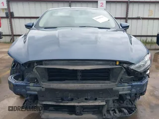 2018 Ford Fusion SE with VIN 3FA6P0H73JR109454, listed as a IAAI auction lot 42438366 with 105,802 mi miles and . Bid and sale history available at DreamBid. Image 6.