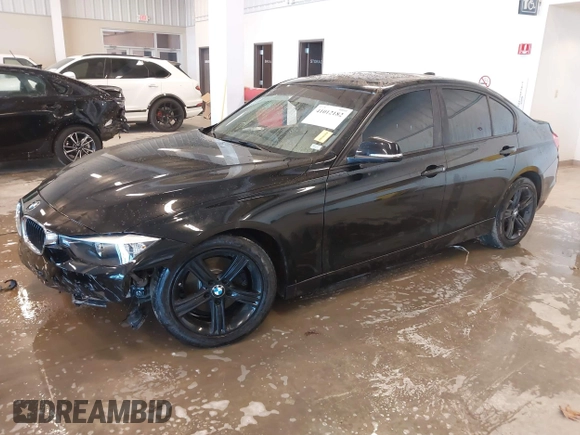 2015 BMW 3 Series 320i xDrive with VIN WBA3C3C56FK203031, listed as a IAAI auction lot 41012182 with 83,611 mi miles and . Bid and sale history available at DreamBid. Image 2.
