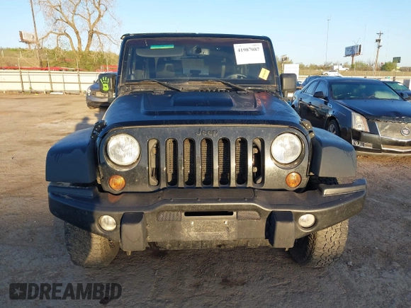 2013 Jeep Wrangler Sahara with VIN 1C4AJWBG8DL565227, listed as a IAAI auction lot 41987087 with 90,644 mi miles and . Bid and sale history available at DreamBid. Image 13.