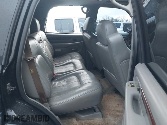 2002 Cadillac Escalade z VIN 1GYEK63N62R205809, wystawiony jako IAAI lot #41090723 z przebiegiem 180 631 mil mil oraz . Historia ofert i sprzedaży dostępna na DreamBid. Obrazek 8.