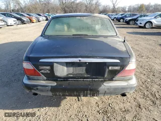 1998 Jaguar XJ with VIN SAJHX1245WC819762, listed as a Copart auction lot 81480174 with 132,491 mi miles and Salvage Title. Bid and sale history available at carsss.com. Image 6.