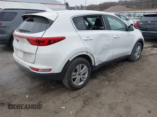 2018 Kia Sportage LX with VIN KNDPM3AC4J7315826, listed as a IAAI auction lot 41521362 with 130,628 mi miles and . Bid and sale history available at DreamBid. Image 4.