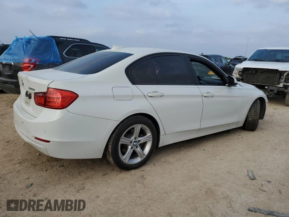 2014 BMW 3 Series 328i with VIN WBA3C1C52EK111563, listed as a Copart auction lot 51465165 with 142,125 mi miles and Salvage title. Bid and sale history available at DreamBid. Image 3.