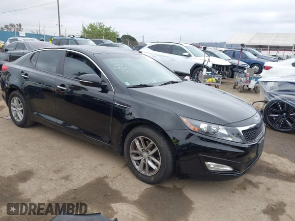 2012 Kia Optima LX with VIN KNAGM4A72C5291451, listed as a IAAI auction lot 42068559 with 121,548 mi miles and . Bid and sale history available at carsss.com. Image 1.