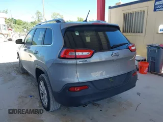 2015 Jeep Cherokee Latitude with VIN 1C4PJLCB1FW770806, listed as a IAAI auction lot 41887226 with 71,268 mi miles and . Bid and sale history available at DreamBid. Image 3.